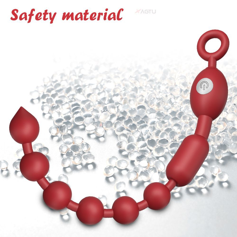 Red beaded electric butt plug with safety pull ring ensures human safety