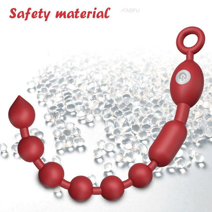 Red beaded electric butt plug with safety pull ring ensures human safety